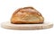 Loaf of Bread on Chopping Board