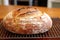 a loaf of bread on a cooling rack