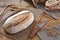 Loaf of bread on a wooden background