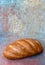 Loaf of crusty salted rye bread
