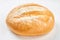 Loaf of fresh bread on white background.