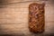 Loaf fruit bread on wooden background.