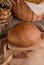 Loaf of traditional round rye bread on wooden background