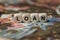Loan - cube with letters, money sector terms - sign with wooden cubes