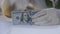 Loan in Dollars. Bundle of 100 Dollar banknotes in Debt. One Hundred Dollars Bills are Stacked in a Bundle Puts On Cash