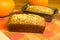 Loaves of pumpkin bread with pumpkins