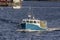 Lobster boat Voyager crossing New Bedford inner harbor