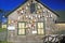 Lobster buoys on side of building in Muscongus Bay in New Harbor ME