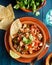 Lobster Ceviche with lime, cilantro and corn chips.