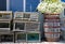 Lobster crates stacked near a wooden barrel