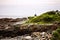 Lobster point lighthouse along the rocky coast of Maine on the Marginal Way path in Ogunquit