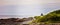 Lobster point lighthouse along the rocky coast of Maine on the Marginal Way path in Ogunquit