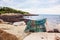 Lobster trap on rock at Oarweed Cove on Marginal way path along the rocky coast of Maine in Ogunquit