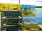 Lobster traps piled at a fishing wharf