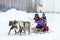 Local aborigines - Khanty, ride children on a reindeer sleigh of three deer, sleigh, winter, â€œSeeing off winterâ€ festival