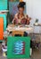 Local artist at the Grand Anse Craft and Spice Market in Grenada