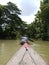 Local boat in short river .. tree