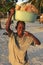 Local boy selling bread at Boca Chica beach