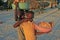 Local boys selling bread at Boca Chica beach