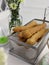 local breadstick called cakoi or youtiao a long golden brown deep fried strip of dough served for tea time