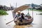 Local Cambodian people rowing along Tonle Sap lake, Puok, Siem Reap Province, Cambodia