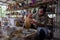 Local craftsman demonstrates on making traditional clay jar called