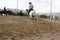 Local farmers riding their quaterhorses, competing at a cutting horse, futurity