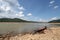 Local fishing boat by the sand on the Mekong River