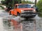 Local Flood - Truck Plowing Through Water