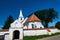 Local fortified catholic church entrance on a hot summer day.