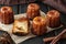 Local French dessert canele on a dark wooden background