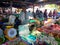 A local garlic and onion male merchant at Hua Hin local market i