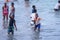 Local Ghana African People Swimming and having Fun in the warm Atlantic Ocean water