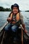 Local guide on the river in a canoe