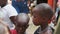 Local Hungry African Small Children Walk on Street Among the People, Zanzibar