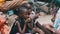 Local Hungry African Small Children Walk on Street Among the People, Zanzibar