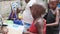 Local Hungry African Small Children Walk on Street Among the People, Zanzibar