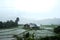 Local hut and homestay village on terraced Paddy rice fields on mountain in the countryside, Chiangmai Province of Thailand.