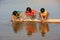 Local kids drinking from water reservoir, Khichan village, India