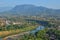 Local landmark of Luang Prabang overlooking the Nam Khan River and local neighborhood with mountains in the background