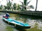 Local life of kerala Houseboat Alleppey Kerala India Alappuzha a man of kerala on wooden boat with umbrella