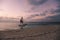 Local Maldivian Boats near the Sandy Beach during the Sunset Time