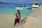 Local man cutting fish in Doctor\'s Cove Beach in Jamaica, Caribbean