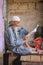 Local man reading newspaper at the street market in Fatehpur Sikri, Uttar Pradesh, India