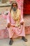 Local man sitting near hindu shrine in Mehtab Bagh Moonlight Ga