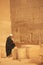 Local man standing at Karnak temple complex, Luxor