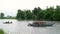 Local people fishing with traditional nets from a boat on a river, Vietnam