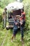 Local people in front of a homemade `ghost train` that run on abandoned railroad tracks