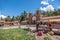 Local people selling souvenirs by San Pedro Church in Andahuaylillas, Peru