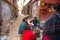 Local people sit in the street. The caste system is still intact today but the rules are not as rigid as they were in the past.